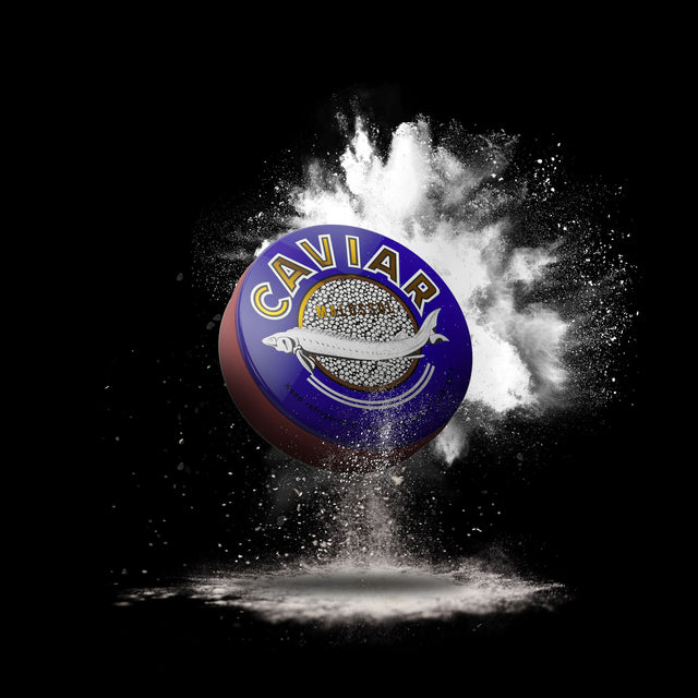 Eichinger Golden Reserve Caviar with custom salt forming a cloud behind a 250g Can of Caviar.