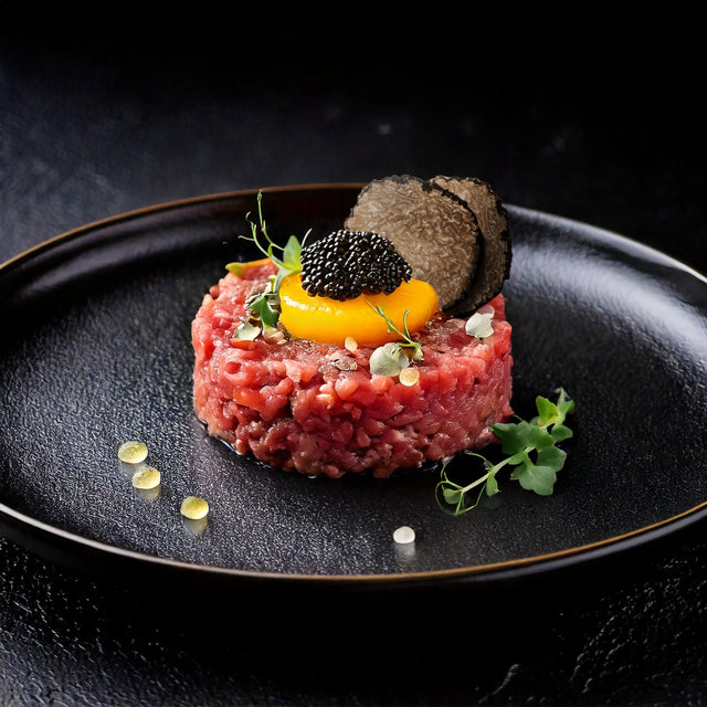 Beef Tartar Toped with Eichinger Caviars Imperial Baerii Caviar and White Truffle