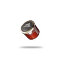 A glass of Red Pearl Trout Caviar full of vibrant red caviar pearls